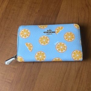 Coach Medium Wallet with orange pattern